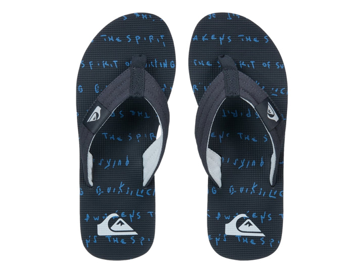 Sandalia Quiksilver Molokai Layback color negro con detalle blanco en la suela y correa de tela.