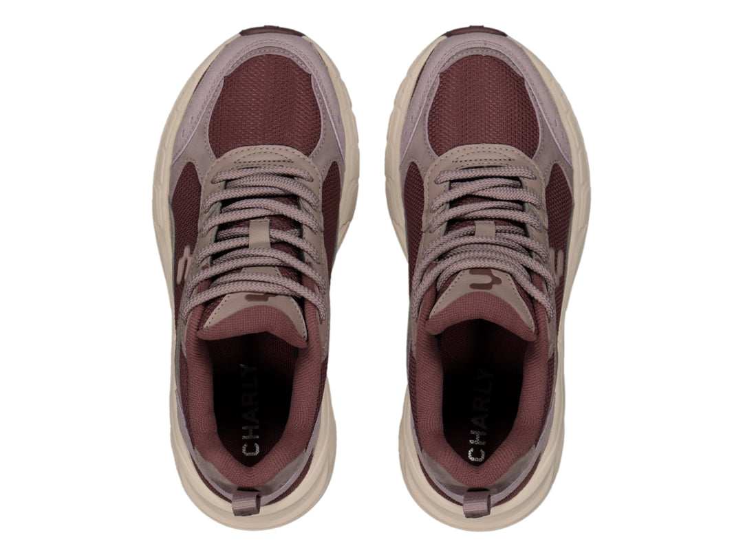 Tenis Charly Fashion Sport color morado con suela gruesa en tono beige.