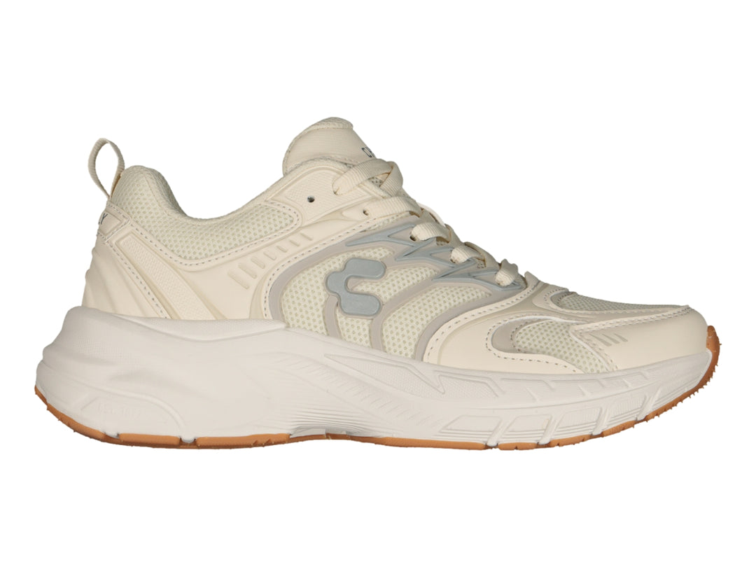 Tenis Charly Fashion Sport color beige con suela gruesa color caramelo y detalles laterales en gris.