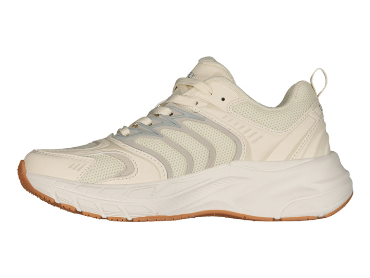 Tenis Charly Fashion Sport color beige con suela gruesa color caramelo y detalles laterales en gris.