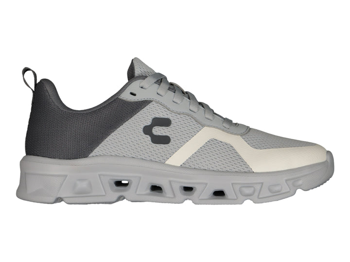 Tenis deportivos Charly color gris con detalles en blanco y suela gruesa.