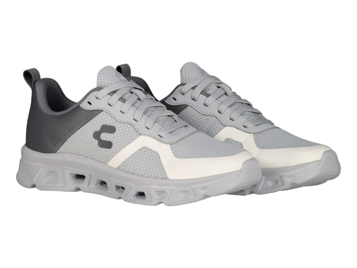 Tenis deportivos Charly color gris con detalles en blanco y suela gruesa.