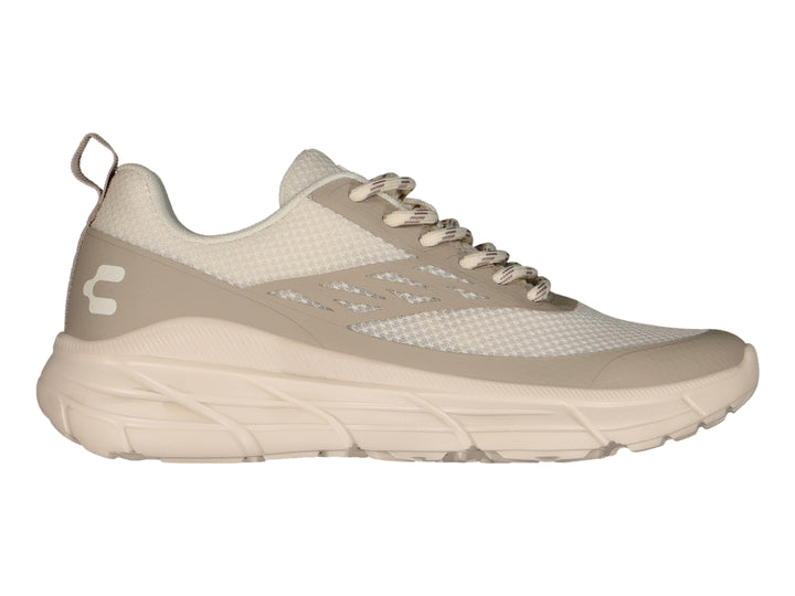 Tenis deportivos Charly color beige con suela gruesa y tejido de malla.
