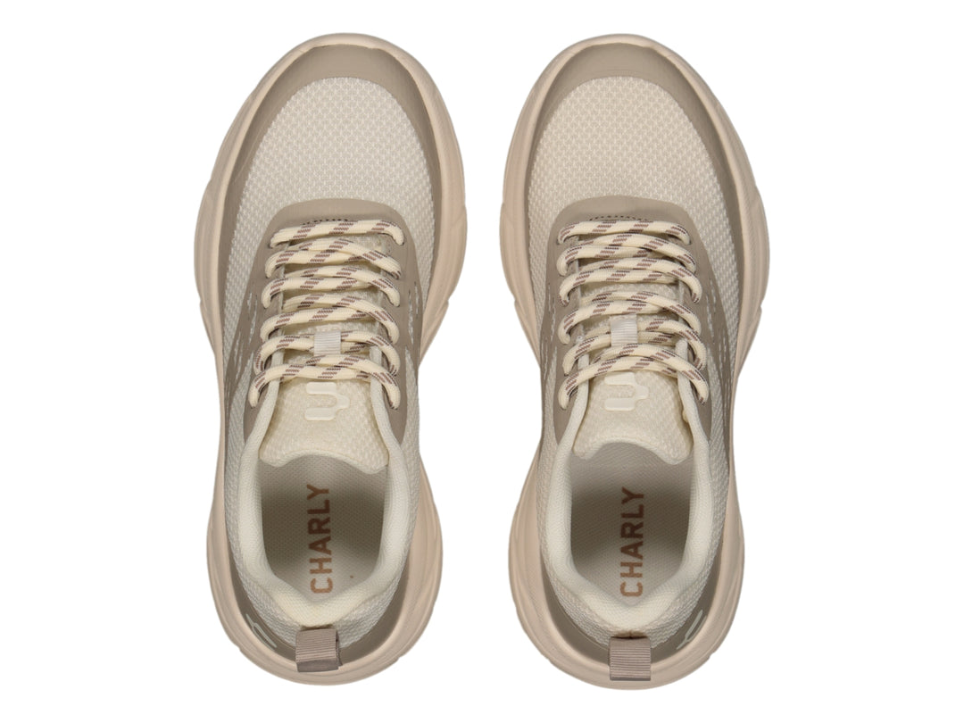 Tenis deportivos Charly color beige con suela gruesa y tejido de malla.