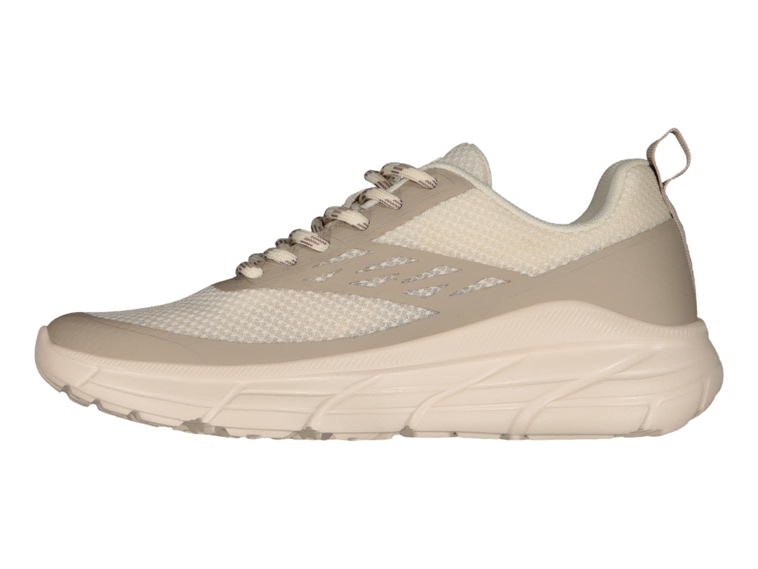 Tenis deportivos Charly color beige con suela gruesa y tejido de malla.