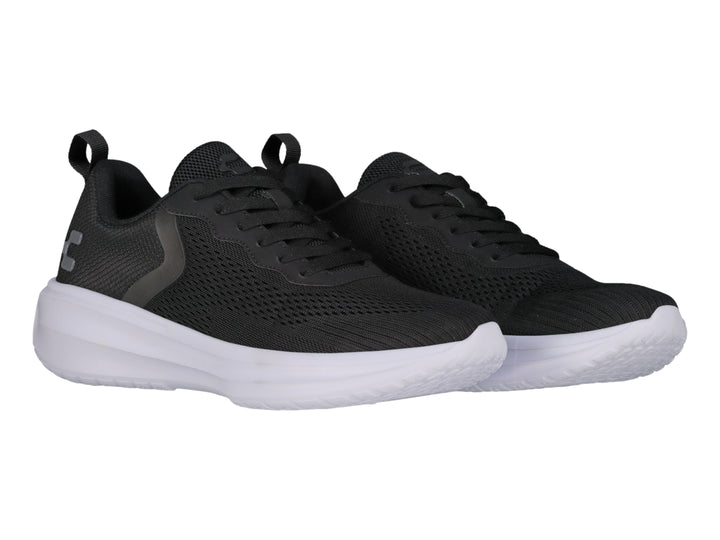Tenis Charly Road Casual color negro con suela blanca y tejido de malla.