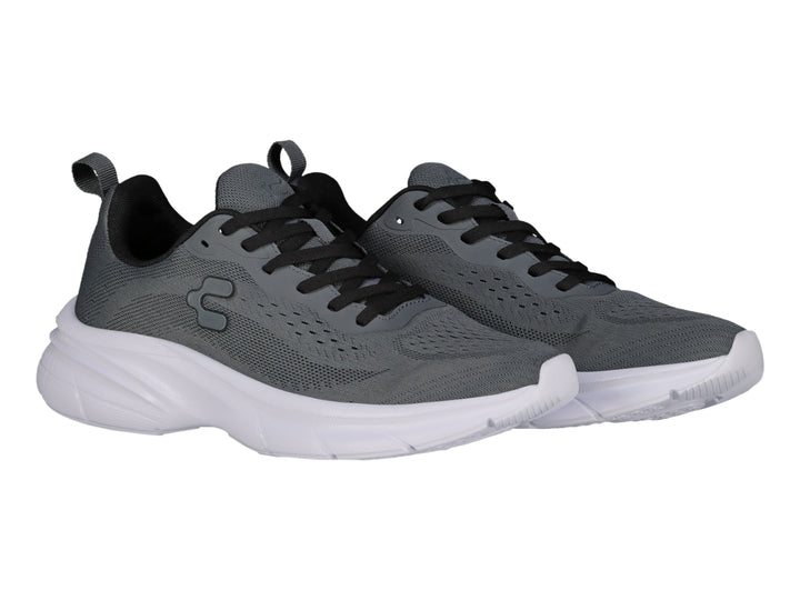 Tenis deportivos Charly color gris oxford con suela blanca y cordones negros.