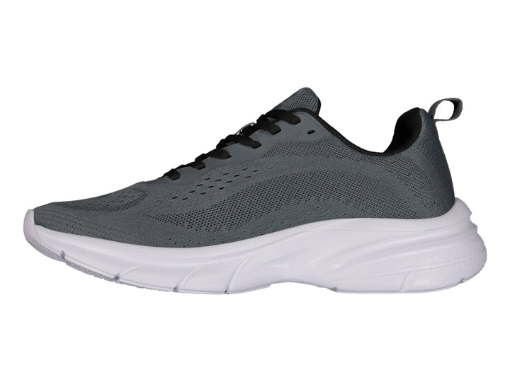 Tenis deportivos Charly color gris oxford con suela blanca y cordones negros.