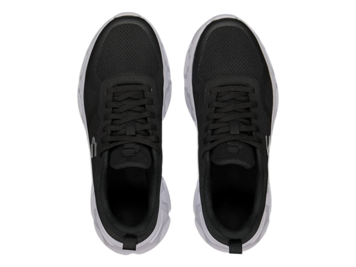 Tenis deportivos Charly color negro con suela blanca y tejido de malla.