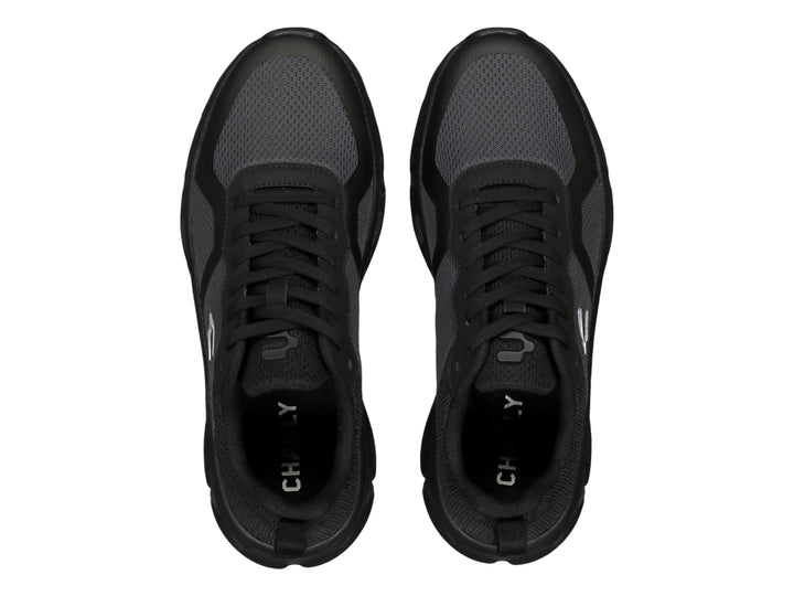 Tenis deportivos Charly Light Sport en color negro y gris con suela gruesa y tejido de malla.