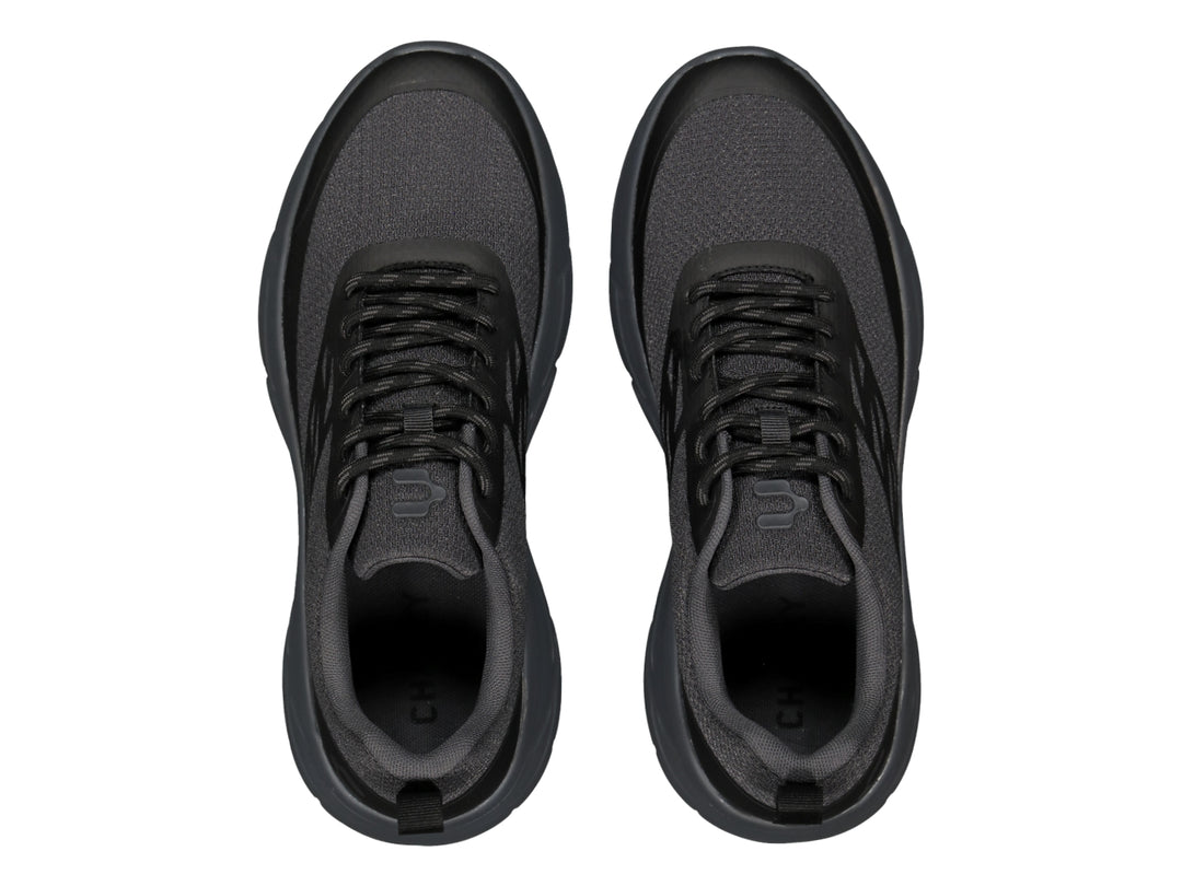 Tenis deportivos Charly Light Sport en color negro con malla transpirable y suela gruesa.