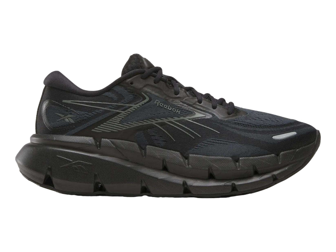 Tenis Reebok Floatzig Double en color negro para hombre, vista lateral.