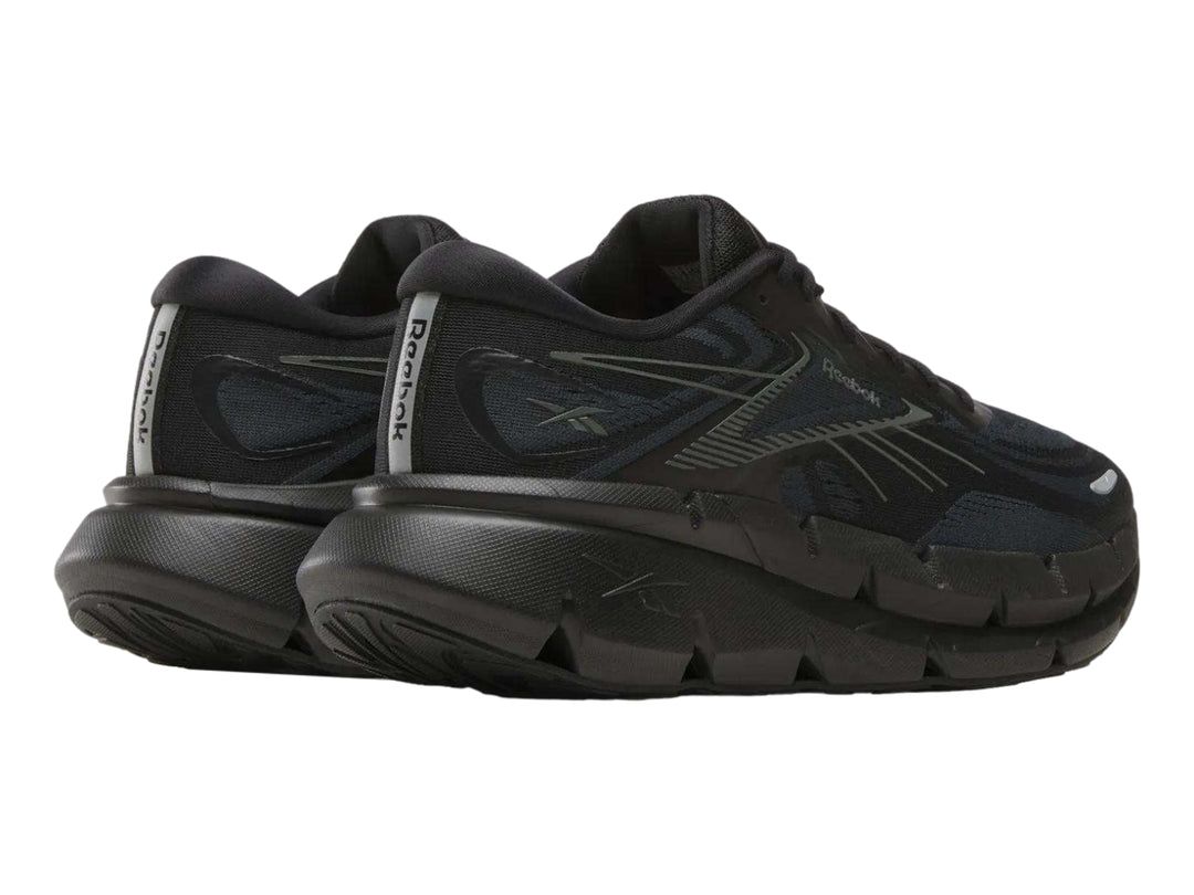 Tenis Reebok Floatzig Double en color negro para hombre, vista lateral.