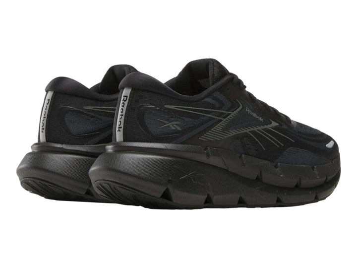 Tenis Reebok Floatzig Double en color negro para hombre, vista lateral.
