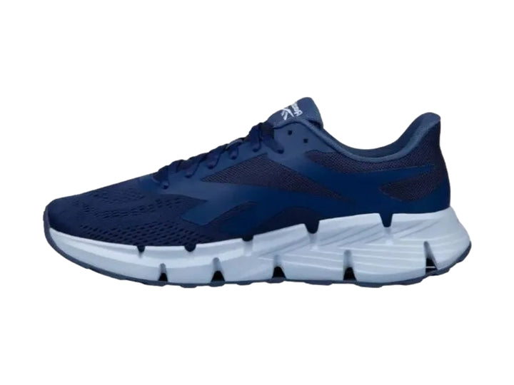 Tenis deportivos Reebok Zig Dynamica 6 en color azul con suela blanca.