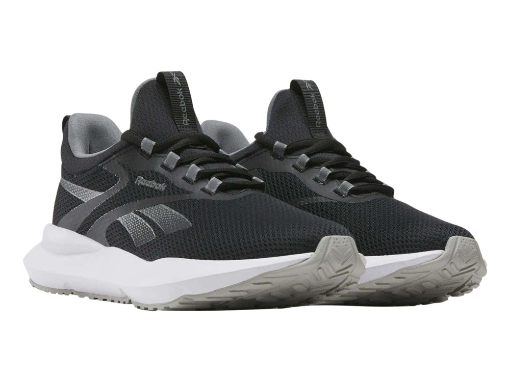 Tenis deportivos Reebok Citryde 2 para mujer en color negro con suela blanca.