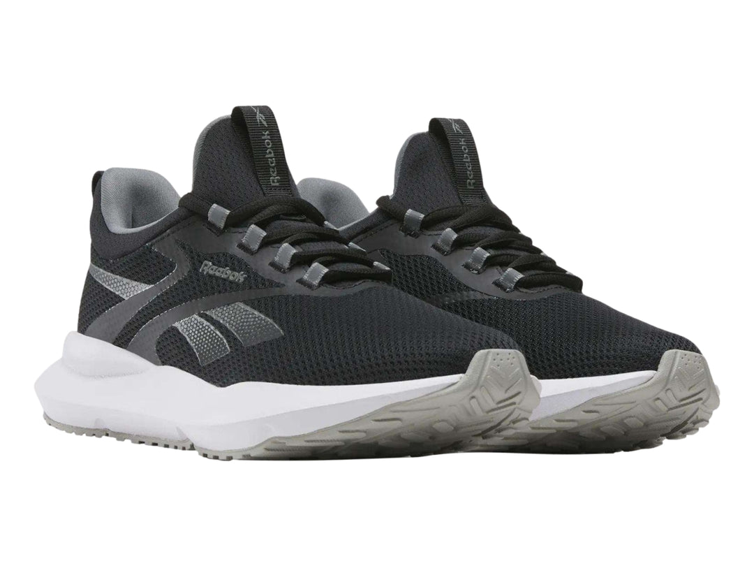 Tenis deportivos Reebok Citryde 2 para mujer en color negro con suela blanca.