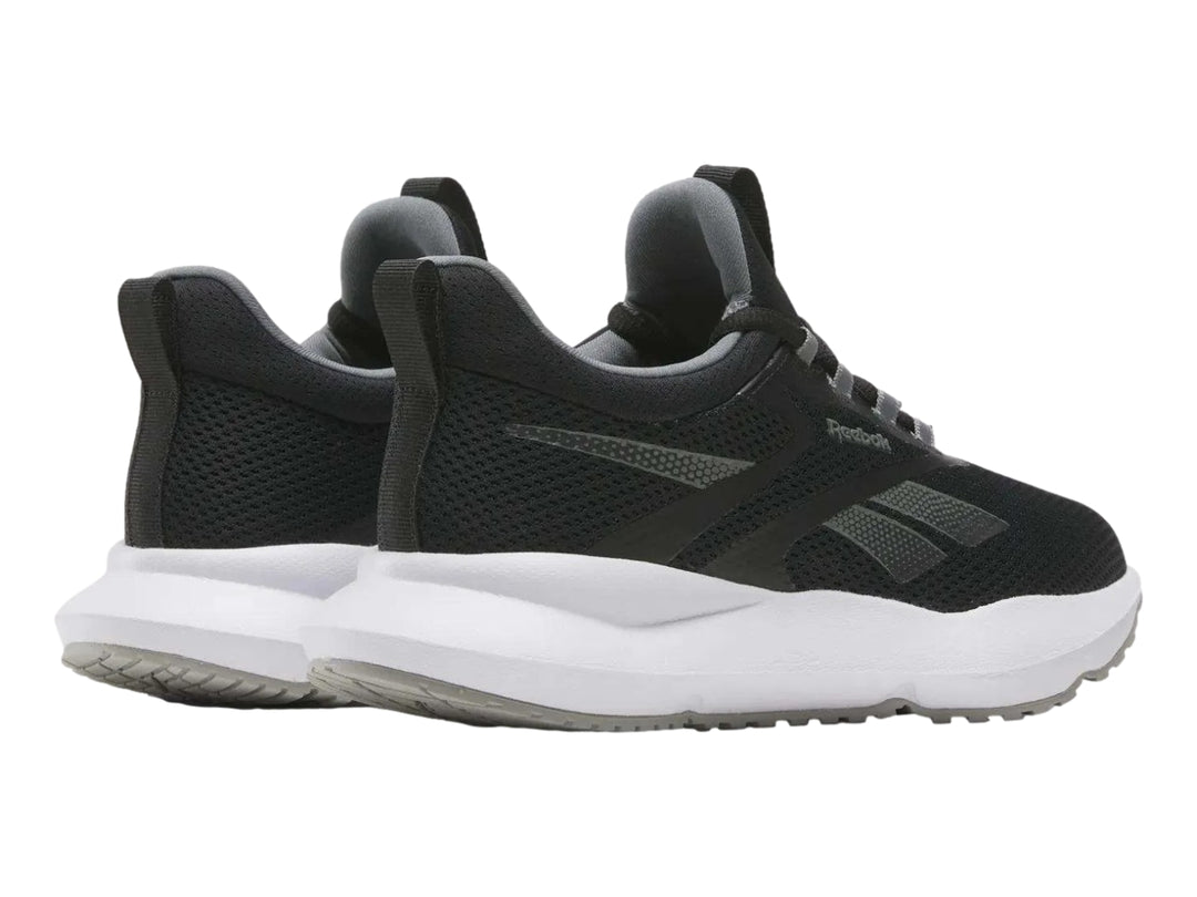 Tenis deportivos Reebok Citryde 2 para mujer en color negro con suela blanca.