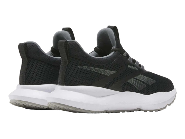 Tenis deportivos Reebok Citryde 2 para mujer en color negro con suela blanca.