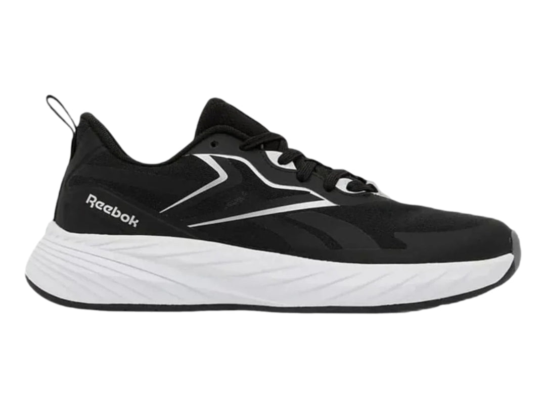 Tenis deportivos Reebok Verse para mujer en color negro con suela blanca.