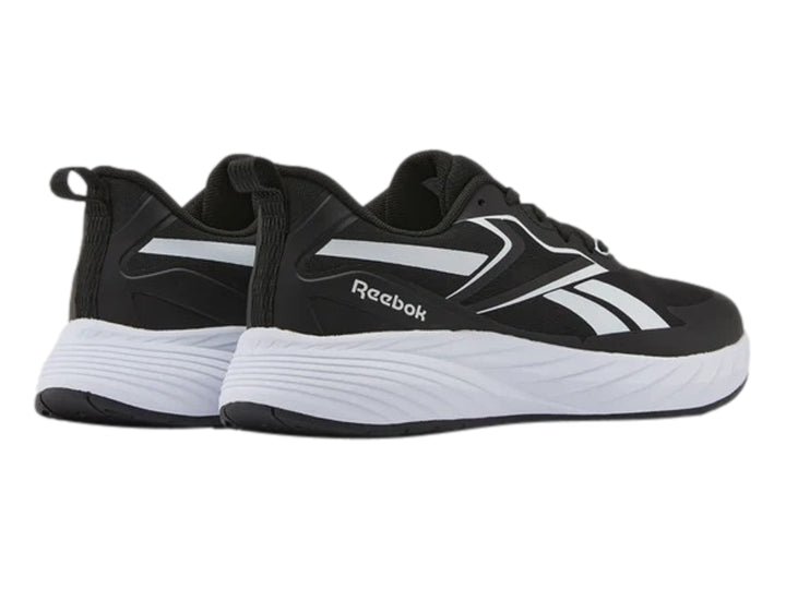 Tenis Reebok Verse color negro con suela blanca y detalles laterales en blanco para hombre.