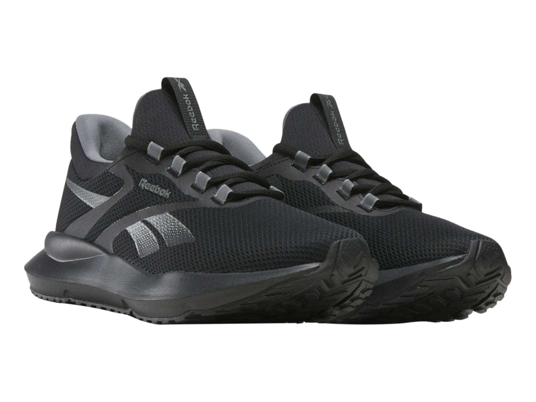Tenis Reebok Citryde 2 color negro para hombre con detalles en gris y suela deportiva.