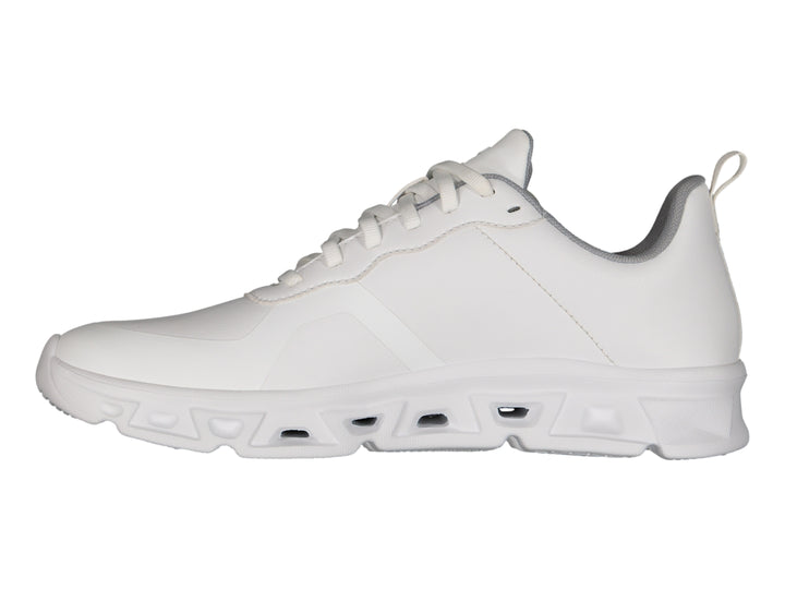 Tenis deportivos Charly Light Sport color blanco con detalles en gris y logo negro lateral.