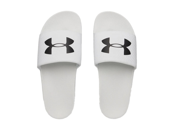 Sandalia Under Armour ARMR Slide de color blanco con logotipo negro en la correa.
