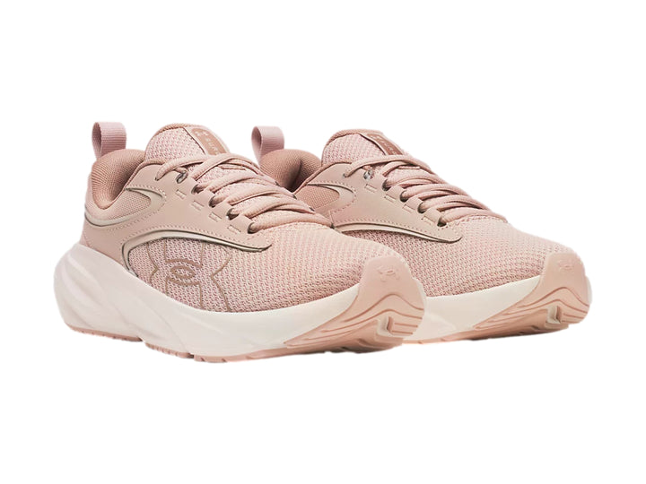 Tenis deportivos Under Armour Surge 5 en color rosa con suela blanca.