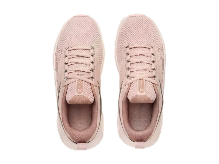 Tenis deportivos Under Armour Surge 5 en color rosa con suela blanca.