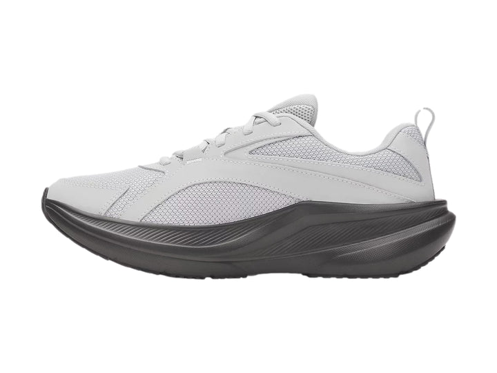 Tenis deportivos Under Armour Assert 11 color gris con suela gris oscuro.