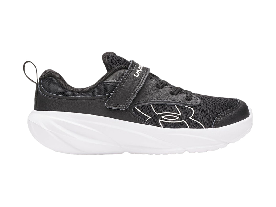 Tenis deportivos Under Armour en color negro con suela blanca y ajuste de correa velcro.