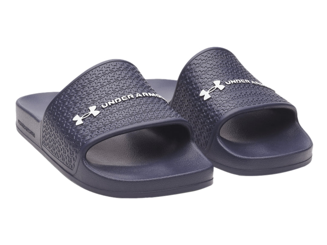 Sandalia Under Armour ARMR Slide Lite color azul oscuro con correa texturizada y logotipo blanco.