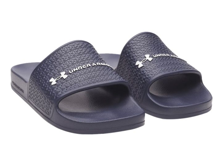 Sandalia Under Armour ARMR Slide Lite color azul oscuro con correa texturizada y logotipo blanco.