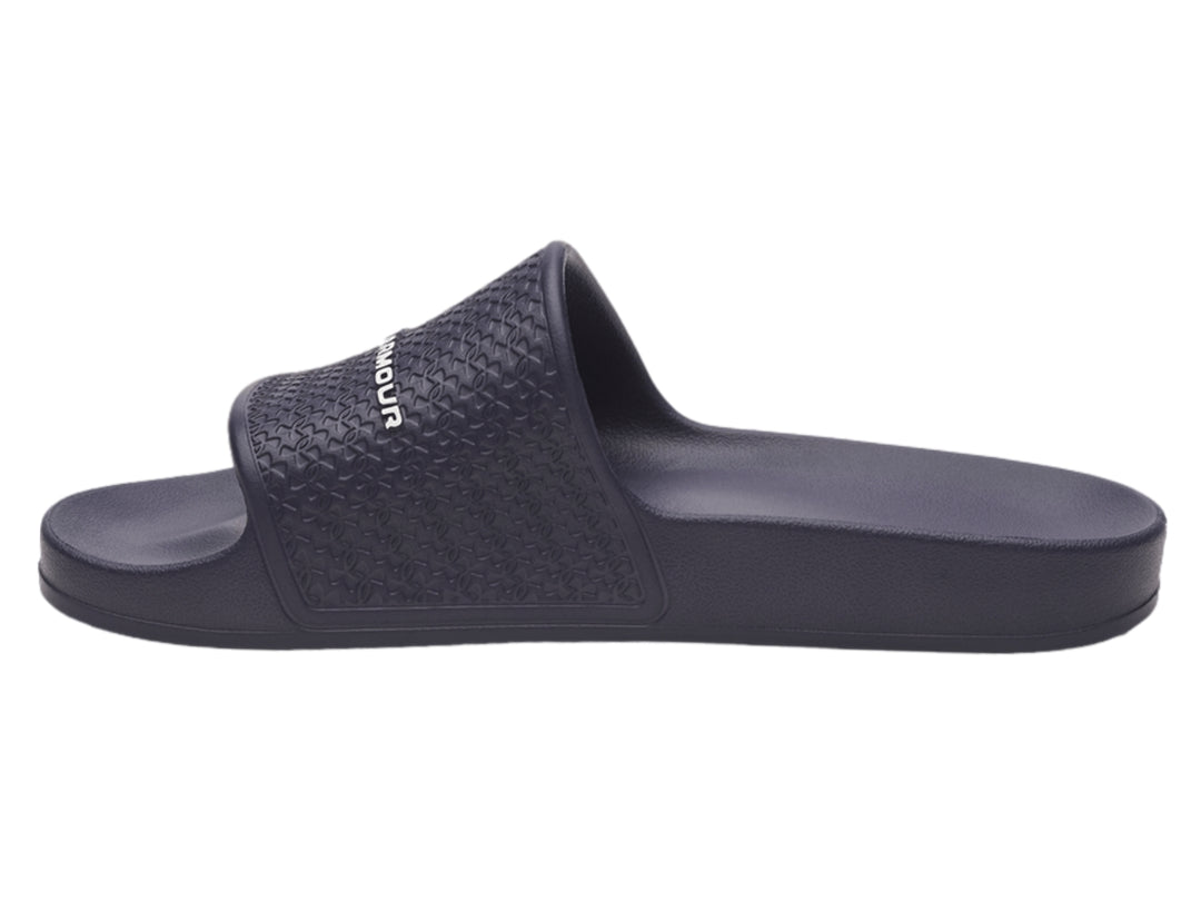 Sandalia Under Armour ARMR Slide Lite color azul oscuro con correa texturizada y logotipo blanco.