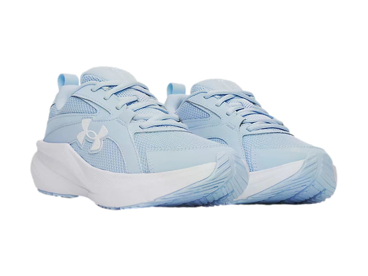 Tenis deportivos Under Armour color azul claro con suela blanca para junior.