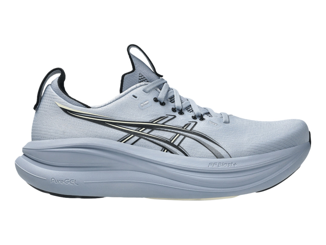 Tenis deportivos ASICS Gel-Nimbus 28 color azul grisáceo con detalles negros, vista lateral.