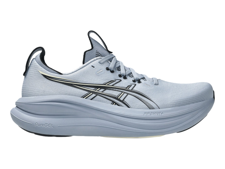 Tenis deportivos ASICS Gel-Nimbus 28 color azul grisáceo con detalles negros, vista lateral.