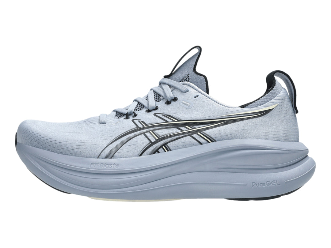 Tenis deportivos ASICS Gel-Nimbus 28 color azul grisáceo con detalles negros, vista lateral.