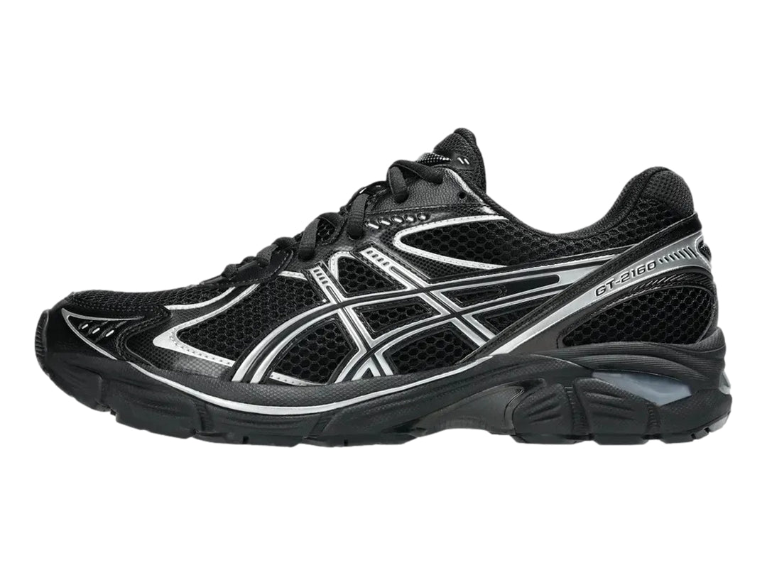 Tenis deportivos ASICS GT-2160 color negro con detalles en plata, vista lateral.