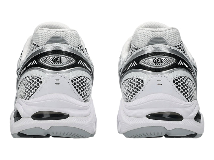 Tenis deportivos ASICS GT-2160 color blanco con detalles en gris grafito y malla transpirable.