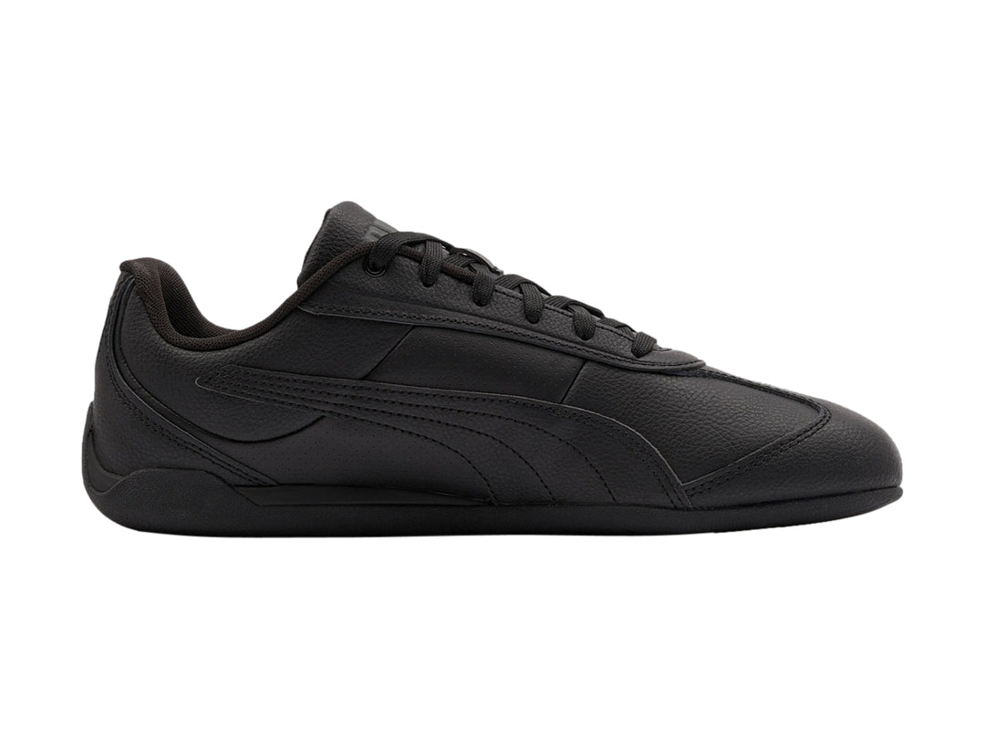 Tenis Puma Replicatch color negro, vista lateral, diseño deportivo de corte bajo.