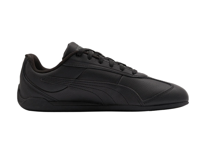 Tenis Puma Replicatch color negro, vista lateral, diseño deportivo de corte bajo.