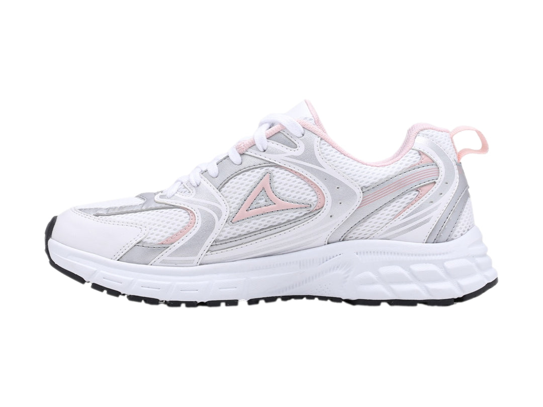 Tenis deportivos Pirma color blanco con detalles en rosa y suela blanca.