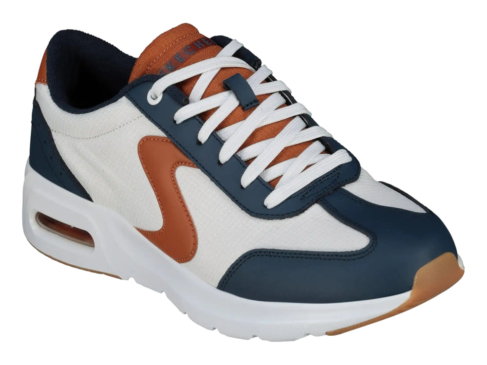 Tenis deportivos Skechers para hombre en colores blanco, azul marino y marrón con suela blanca.