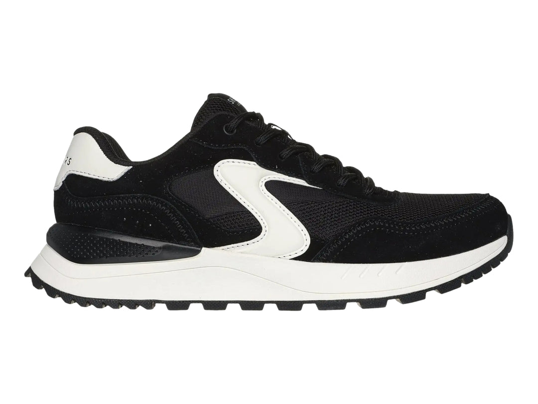 Tenis deportivos Skechers color negro con detalles y suela blanca.