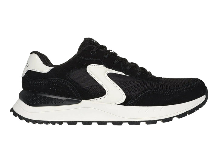 Tenis deportivos Skechers color negro con detalles y suela blanca.