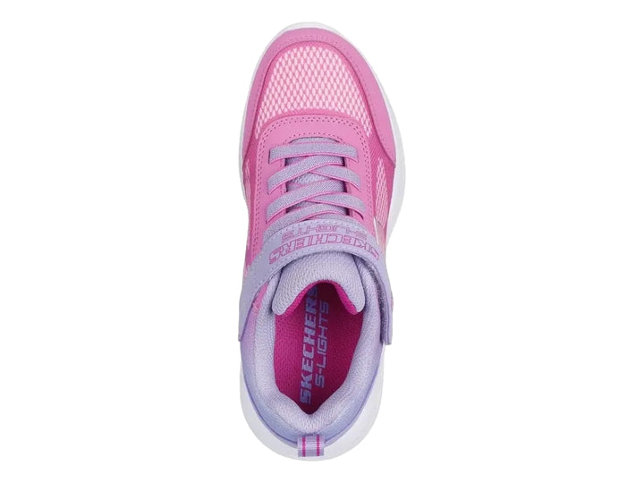 Tenis Skechers deportivos en color rosa y lavanda con suela blanca y cierre de velcro.