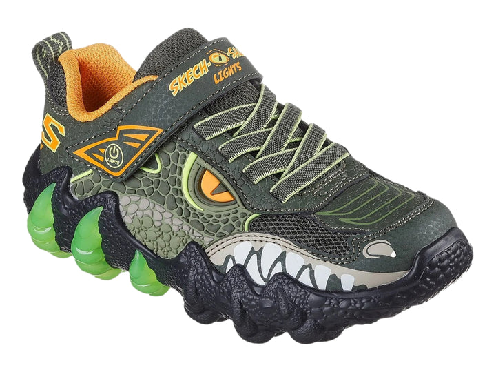 Tenis SKECHERS color olivo y negro con diseño de dinosaurio y garras verdes iluminadas en la suela.