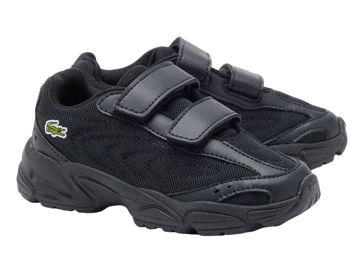 Tenis Lacoste Storm 96 2K Lite color negro con cierres de velcro y suela robusta.